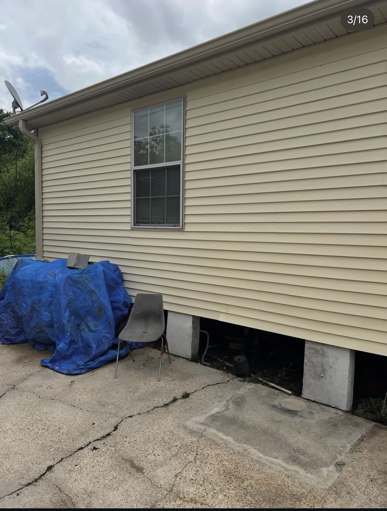 The same home siding clean and bright after pressure washing