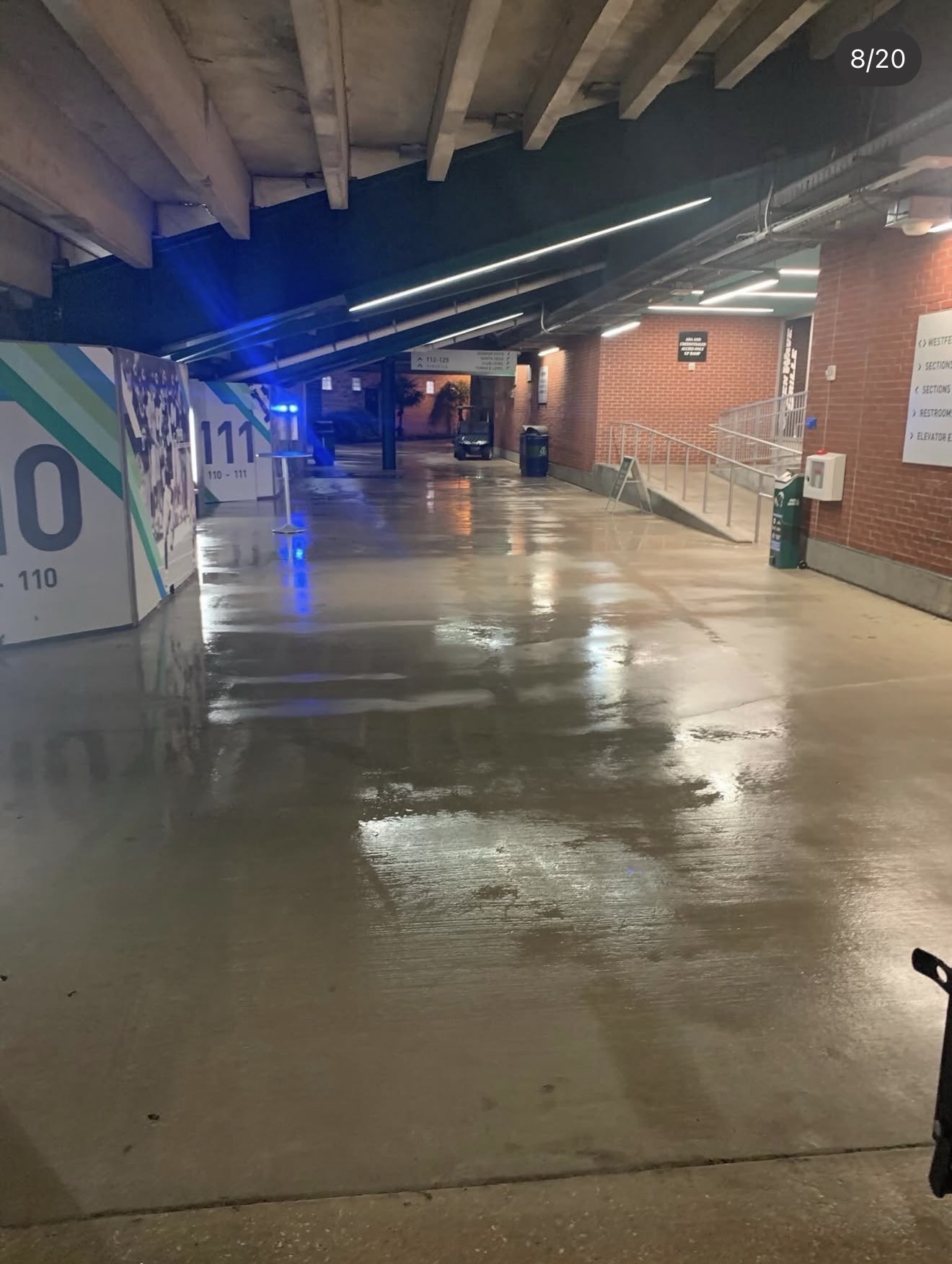 Freshly washed stadium concourse walkway at Tulane University